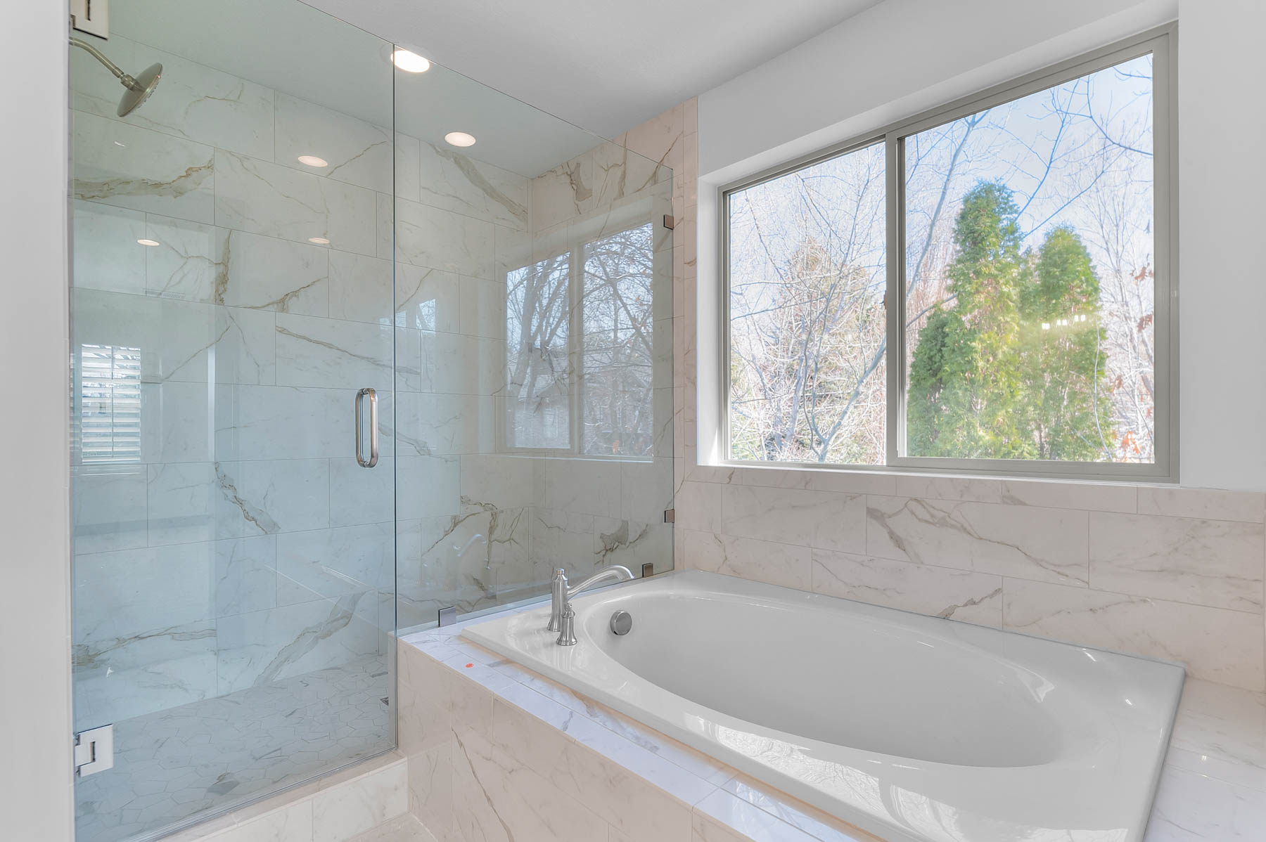 Full bath with a bath, a marble finish shower, and recessed lighting