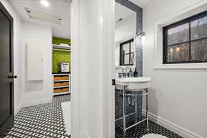 Half bathroom with baseboards