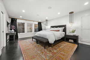 Master Bedroom with recessed lighting and parquet flooring