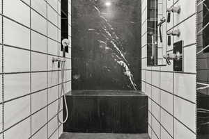 Master Bathroom featuring tiled shower