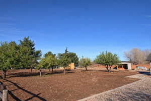 View of yard with a rural view