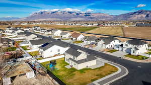 Aerial perspective of suburban area featuring mountains