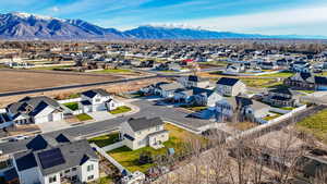 Aerial view of residential area with a mountainous background