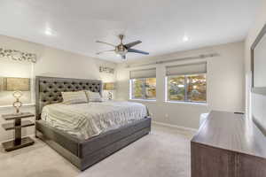 Bedroom featuring carpet floors and a ceiling fan