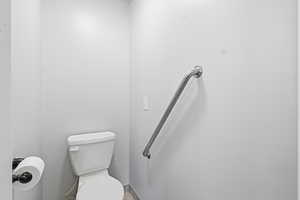 Owners suite bathroom with toilet