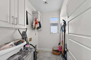 Laundry area featuring cabinet space and washer hookup