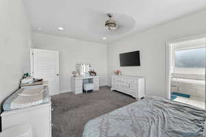 Bedroom featuring carpet flooring, a ceiling fan, and recessed lighting