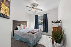 Bedroom with carpet floors and ceiling fan