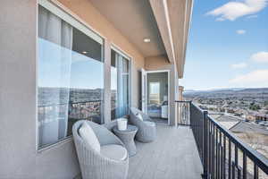 Balcony with a mountain view and a residential view