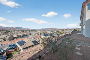 Exterior space with a residential view and a mountain view