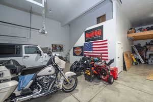 Garage featuring a garage door opener