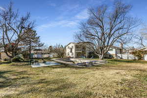 View of yard with a patio area and a swimming pool