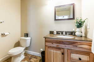 Three quarter bath with vanity, shower and tile floors