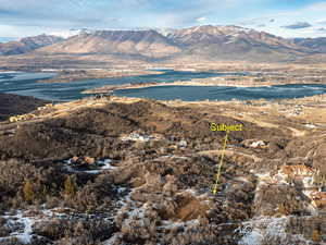 View of mountain background with a nearby body of water