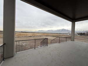 View of patio / terrace featuring a mountain view