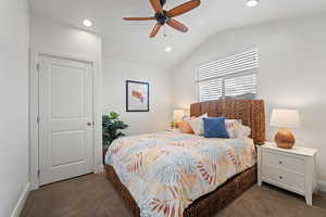 Bedroom with Vaulted Ceilings & a TV