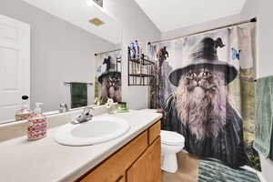 Full bathroom with vanity and light tile patterned flooring