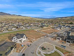 Aerial view of residential area with a mountainous background
