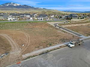 Aerial view of residential area featuring mountains