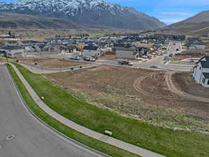 Aerial perspective of suburban area with a mountain backdrop