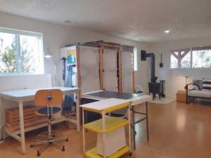 Family room -Use as one large area  or section off - Crafting workspace  & Conversation area.  Daylight windows