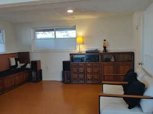 additional area off family room, built in bench, cork flooring