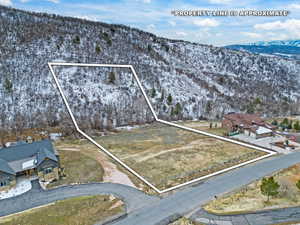 View of property location featuring property parcel outlined and a mountain backdrop