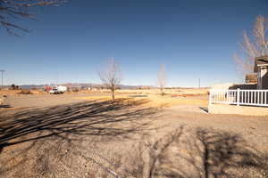 View of yard with a mountain view