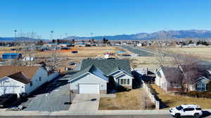 Aerial perspective of suburban area featuring mountains