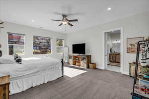 Bedroom with carpet floors, ceiling fan, recessed lighting, and ensuite bath