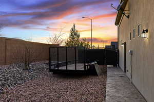 View of fenced backyard