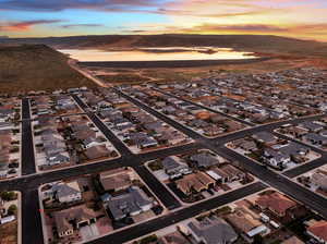 Aerial view at dusk of a residential view and a mountain view