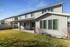 Rear view of house featuring a patio area