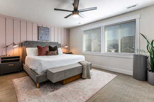 Bedroom featuring carpet floors and ceiling fan