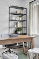 Home office featuring wood finished floors