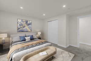 Bedroom featuring recessed lighting, light colored carpet, and a closet