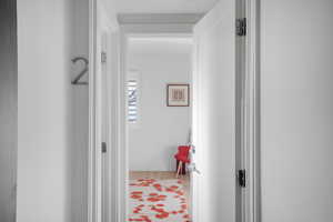 Hall with light wood-style floors