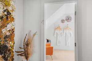Walk in closet featuring carpet