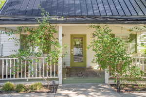Doorway to property with a porch