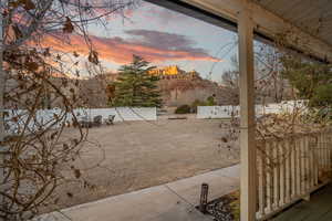 Patio terrace at dusk featuring a patio area