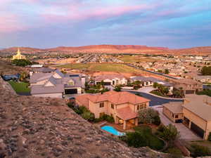 Aerial view at dusk of a residential view and a mountain view