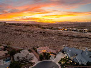 Aerial view at dusk of a residential view and a mountain view