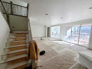 Living area featuring stairway