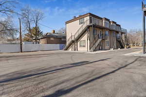 View of building exterior featuring stairway