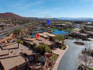 Aerial view of residential area featuring mountains