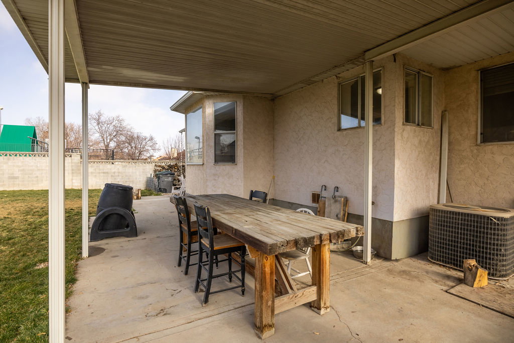 View of patio with outdoor dining area