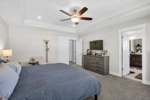 Bedroom with ornamental molding, carpet floors, recessed lighting, a ceiling fan, and ensuite bath