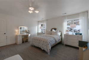 View of carpeted bedroom