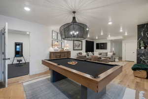 Recreation room featuring light wood-style floors, billiards, and recessed lighting