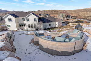 Exterior space with a patio and a mountain view